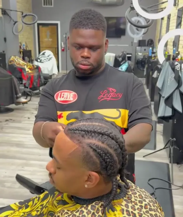 Austen Kallas at work in Top Tier Hair Studio